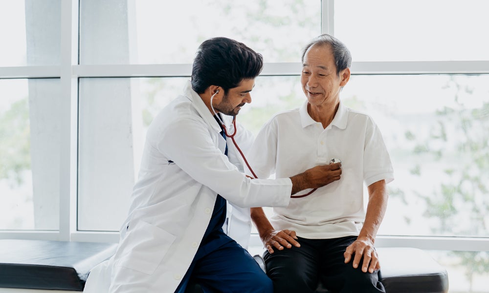 Doctor checking heartbeat at Holy Cross Health 